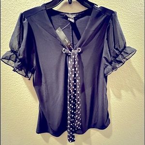 Adele & May, dark blue color, medium size.